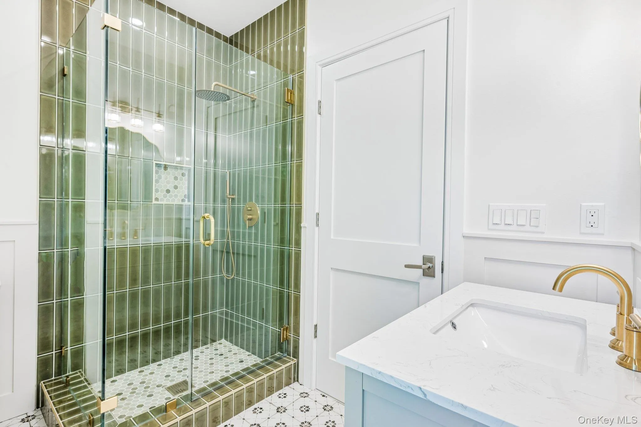 An emerald-tiled glass shower with brushed-gold fixtures. In summer, Bodhi's beach shack at Corey Beach, about 0.7 miles away, pours frozen cocktails with weekend live music by the bay. An emerald-tiled glass shower with brushed-gold fixtures. In summer, Bodhi's beach shack at Corey Beach, about 0.7 miles away, pours frozen cocktails with weekend live music by the bay.