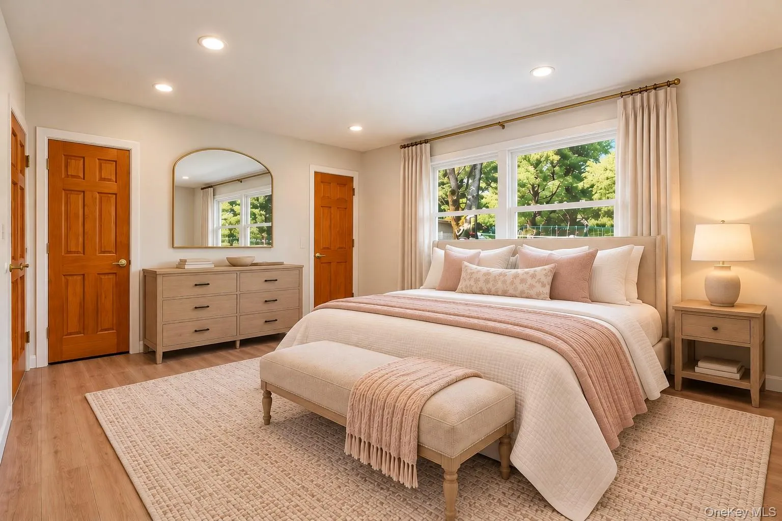 Virtually Staged Main Floor Bedroom - could serve as a primary bedroom door to full bathroom Virtually Staged Main Floor Bedroom - could serve as a primary bedroom door to full bathroom