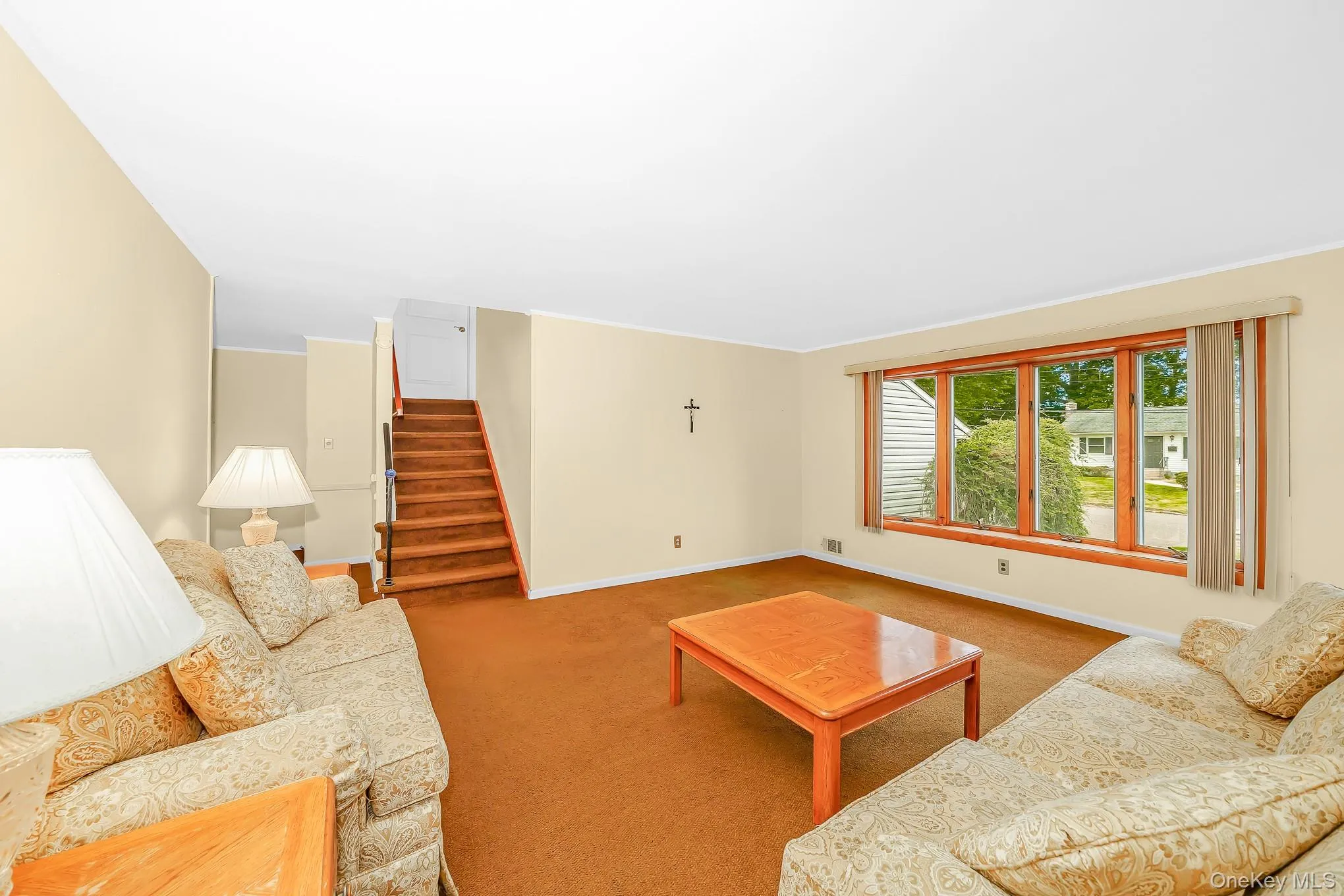 Living room with carpet flooring Living room with carpet flooring