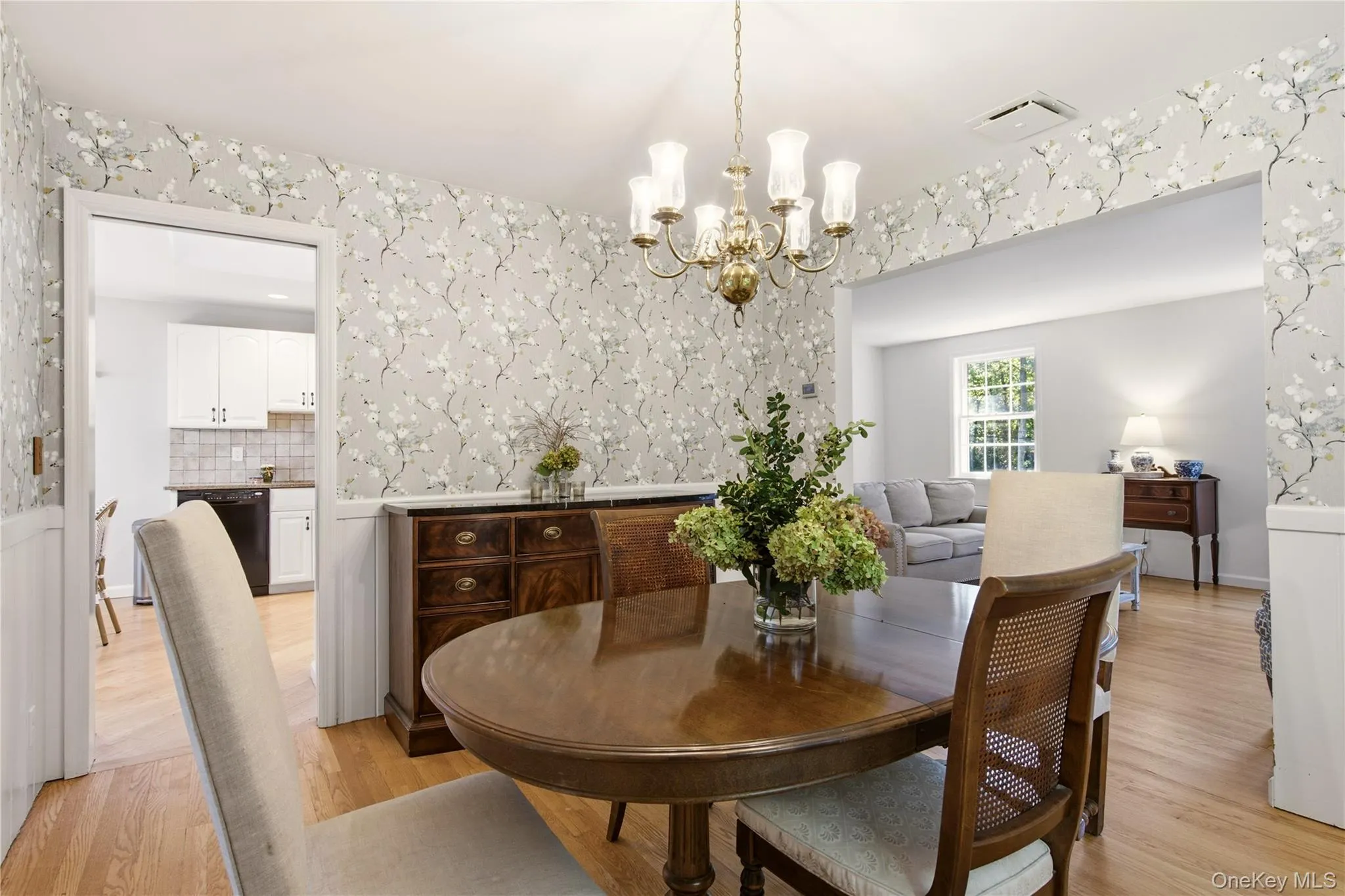 Dining room leads to kitchen, living room and family room Dining room leads to kitchen, living room and family room