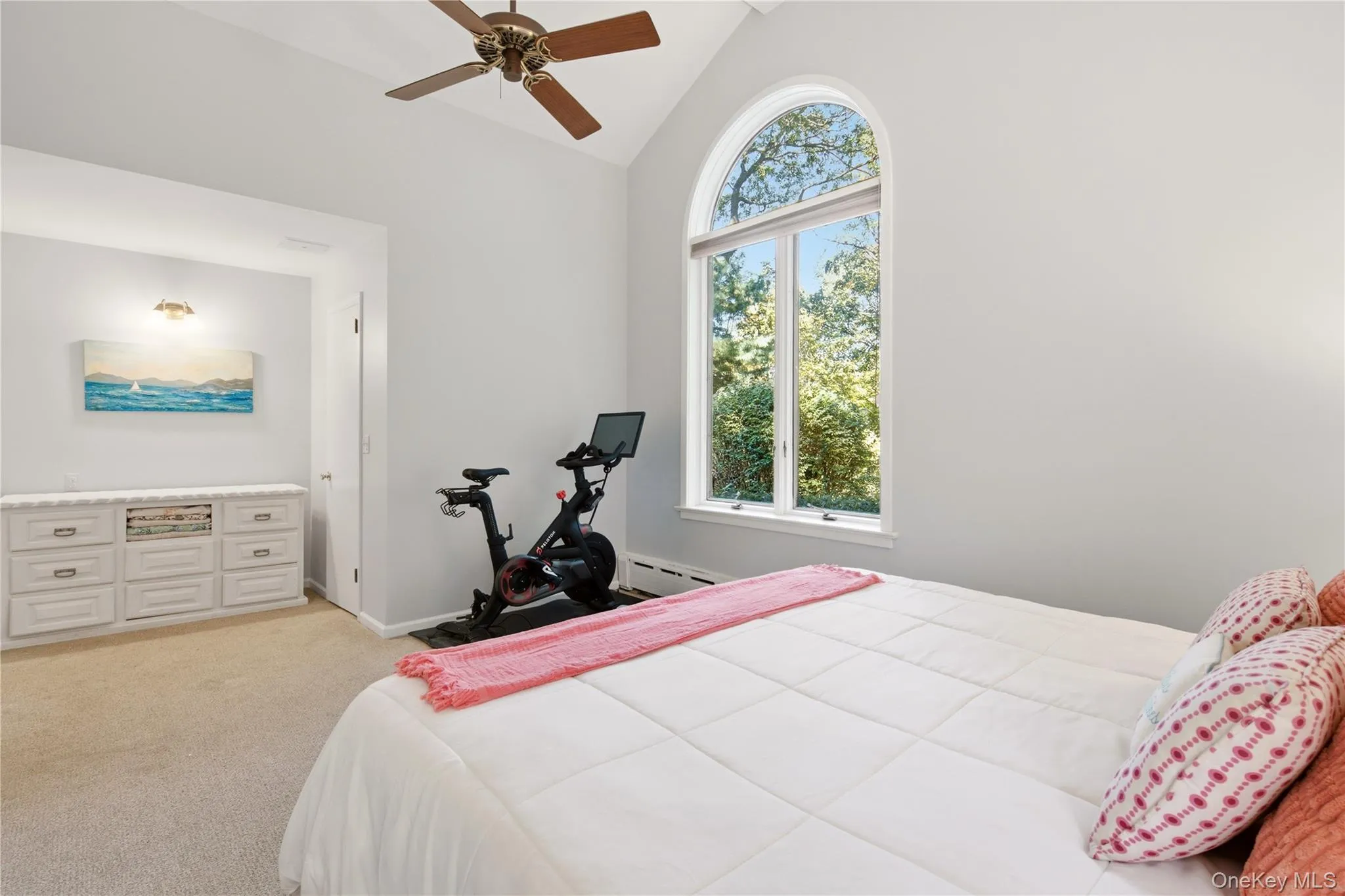 with walk in closet that has custom organizer system with walk in closet that has custom organizer system