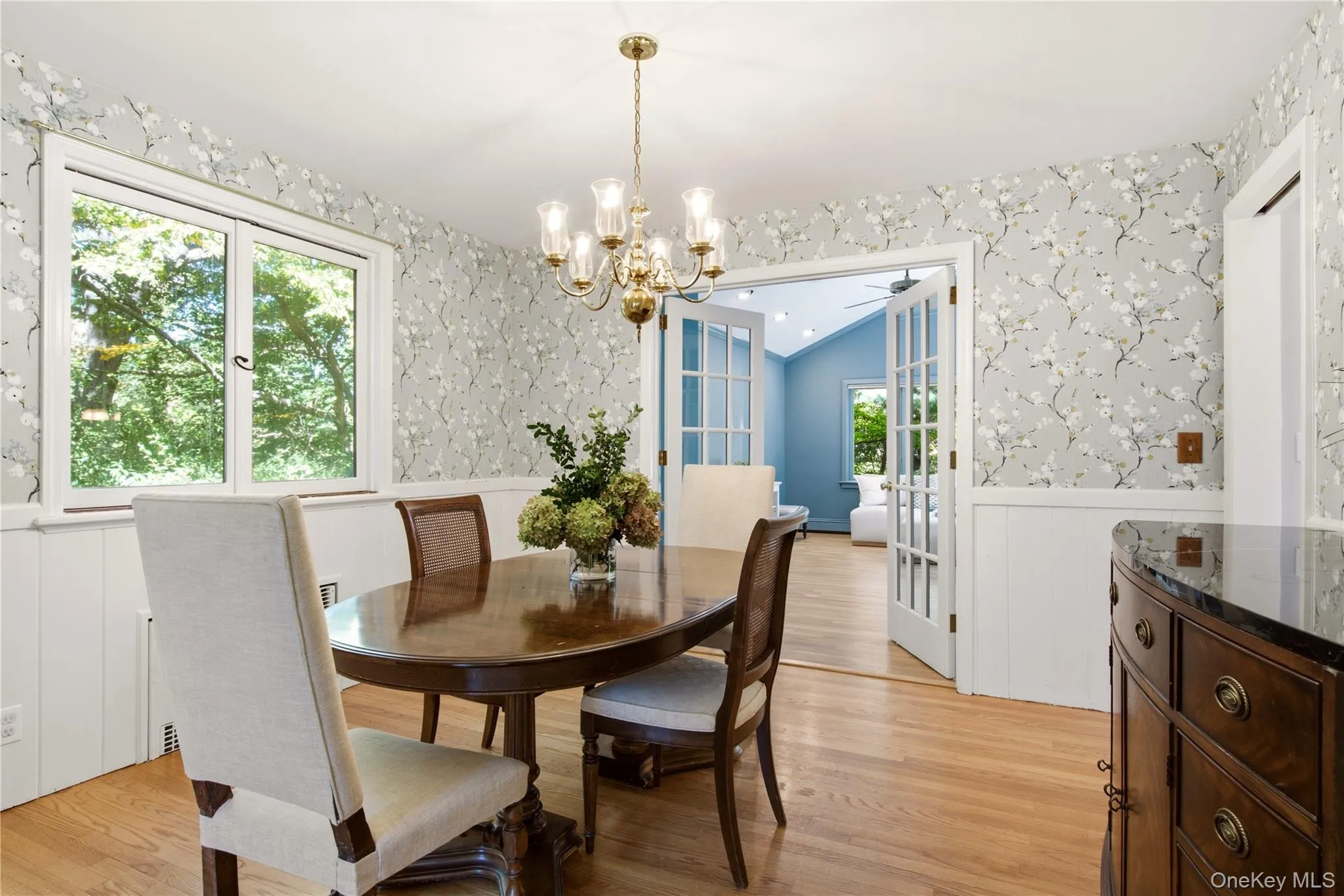 Formal dining area open to living room for extended entertaining Formal dining area open to living room for extended entertaining