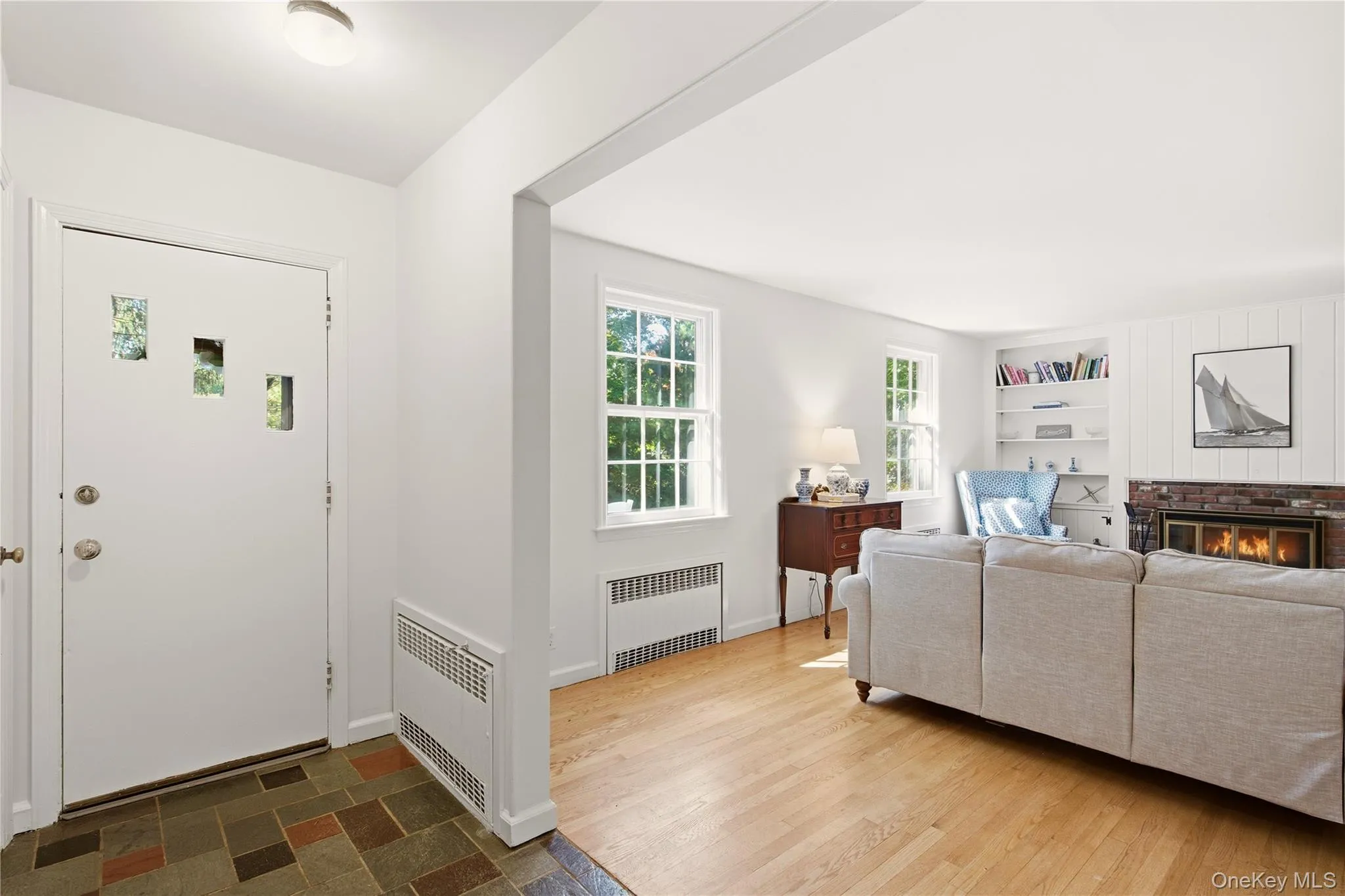 Foyer has coat closet and leads to living room Foyer has coat closet and leads to living room