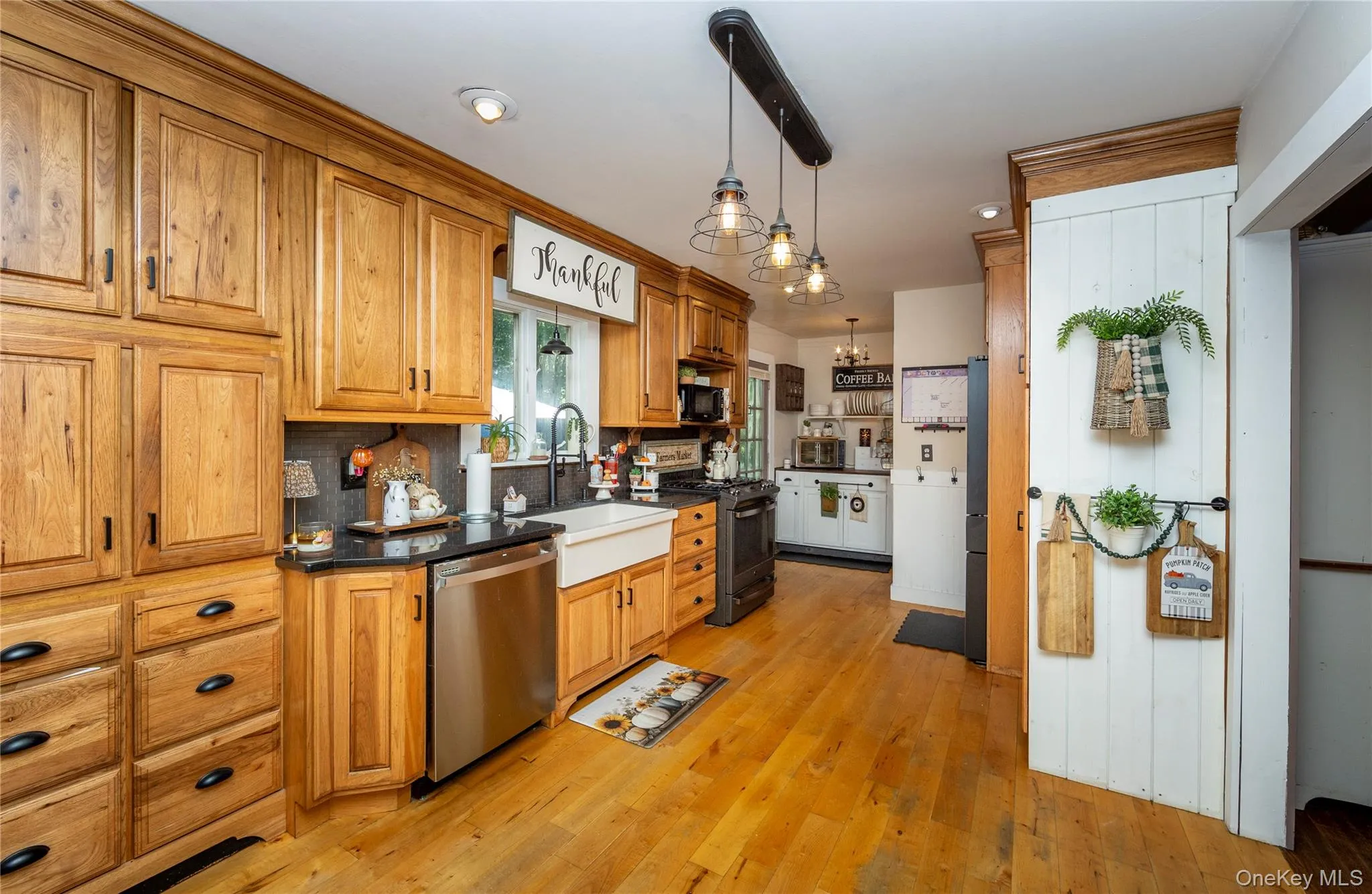 Deep farmhouse sink and abundant cabinetry. Deep farmhouse sink and abundant cabinetry.