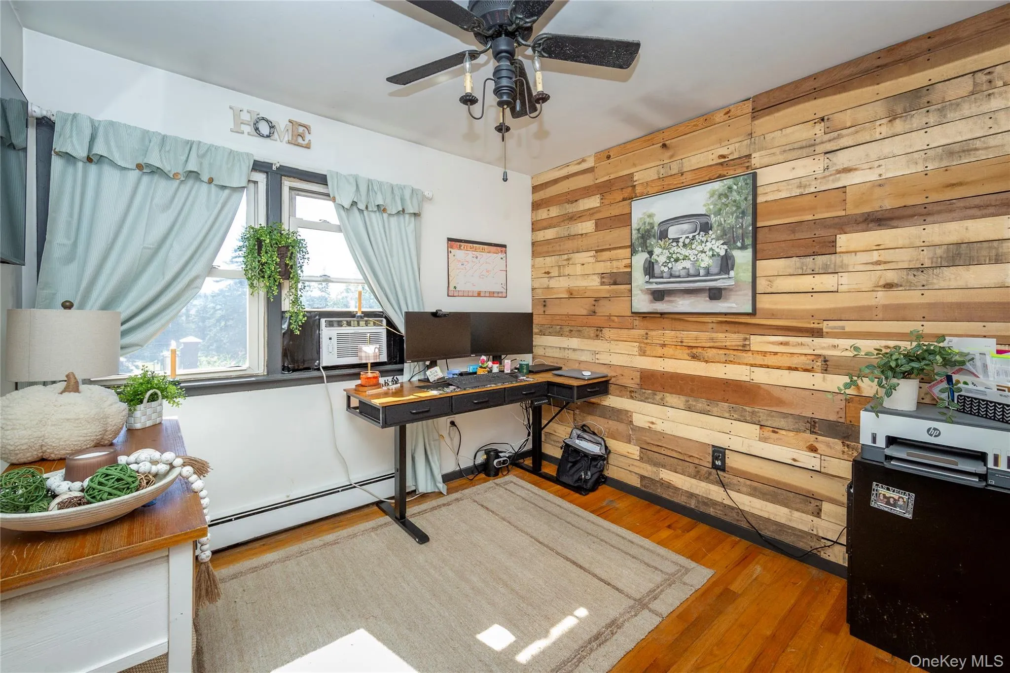 One of the bedrooms is currently being used as a home office. One of the bedrooms is currently being used as a home office.