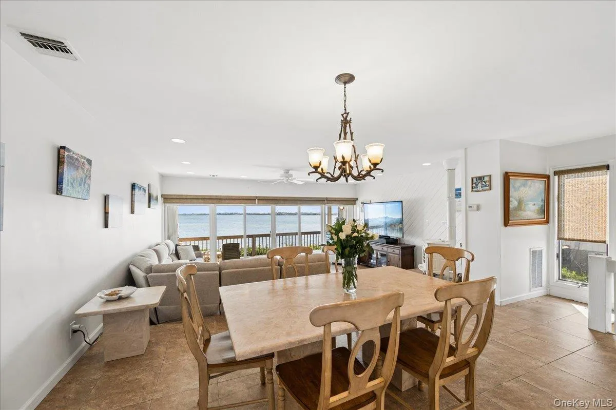 Formal Dining Area with Beautiful Bay Views. Formal Dining Area with Beautiful Bay Views.