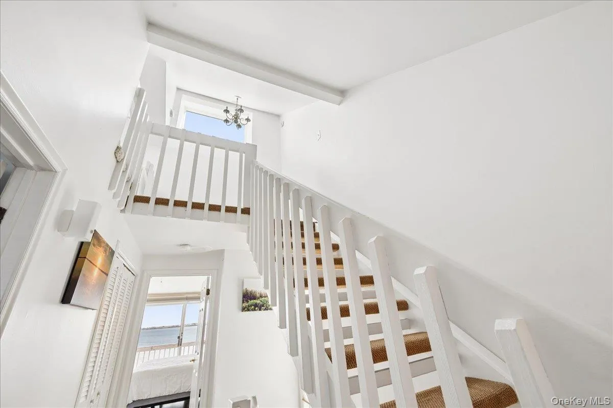 Dramatic stairway leading to the loft. Dramatic stairway leading to the loft.