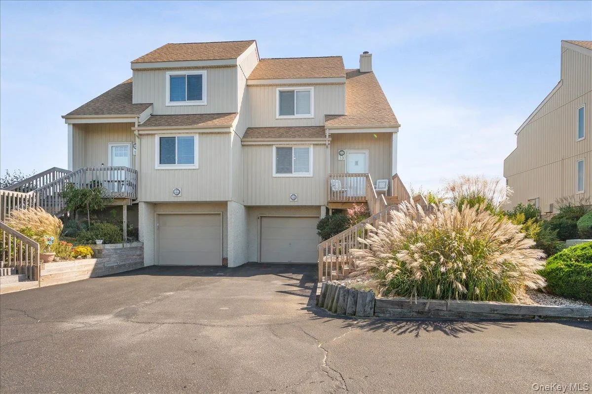 End Right Unit, attached garage, and a private entry way. Only two units in building! End Right Unit, attached garage, and a private entry way. Only two units in building!