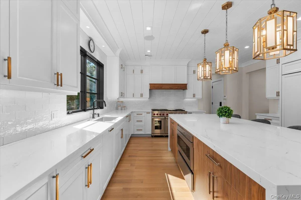 Chef's kitchen with extra large center island. Chef's kitchen with extra large center island.