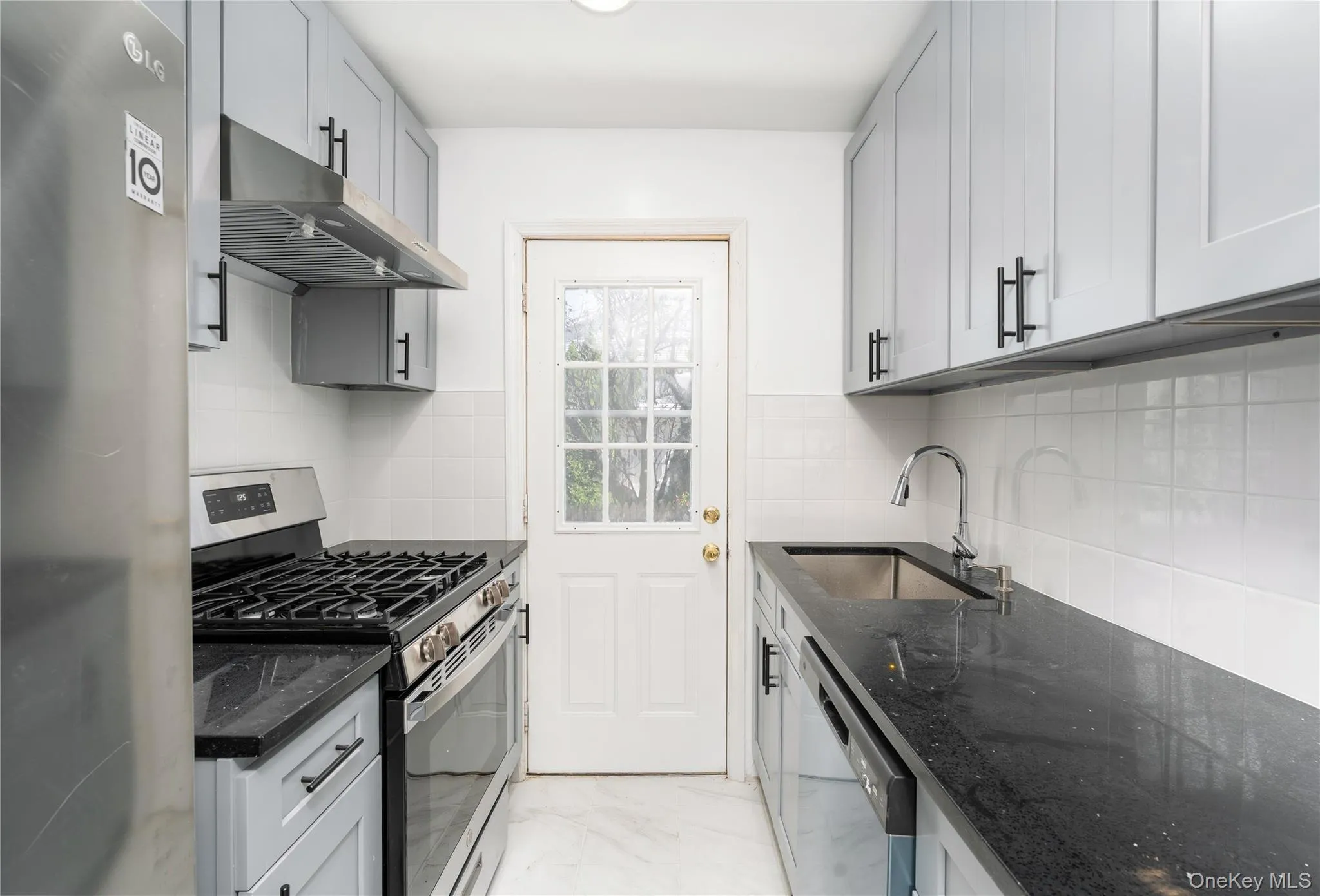 New Kitchen, SS appliances, sleek cabinetry extended height, stone counter tops, deep sink New Kitchen, SS appliances, sleek cabinetry extended height, stone counter tops, deep sink