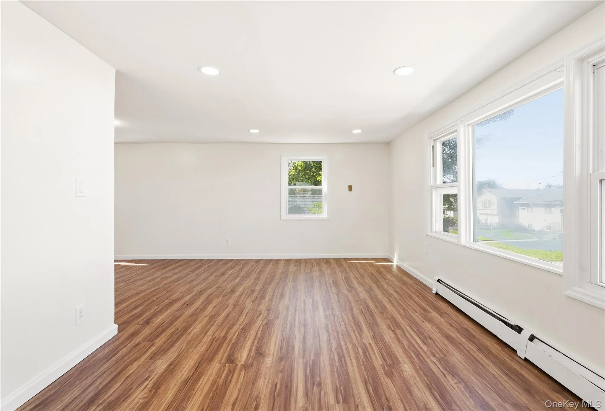 Upper-level living space with large picture window Upper-level living space with large picture window