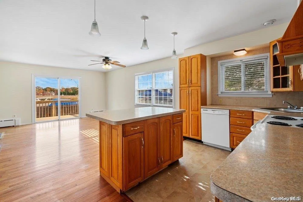 Living room leads into a sundrenched Kitchen featuring an open floor plan to family room Living room leads into a sundrenched Kitchen featuring an open floor plan to family room