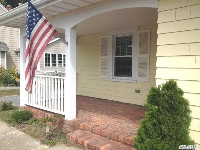 View of front entry with a relaxing brick porch View of front entry with a relaxing brick porch