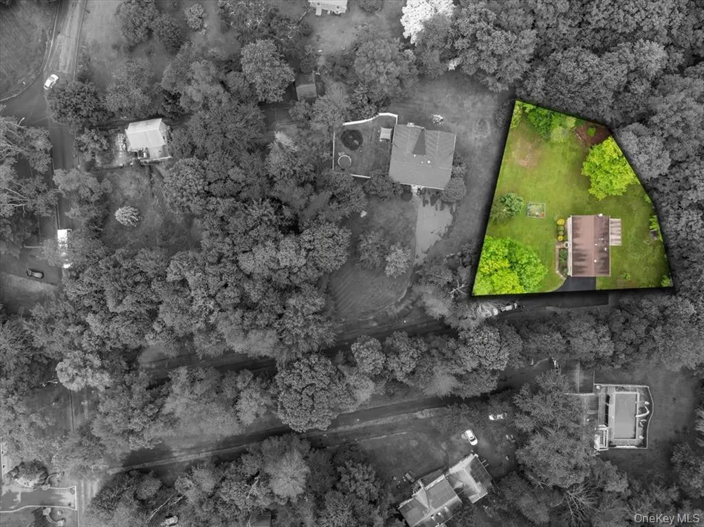 Aerial overview of property's location with property boundaries highlighted Aerial overview of property's location with property boundaries highlighted