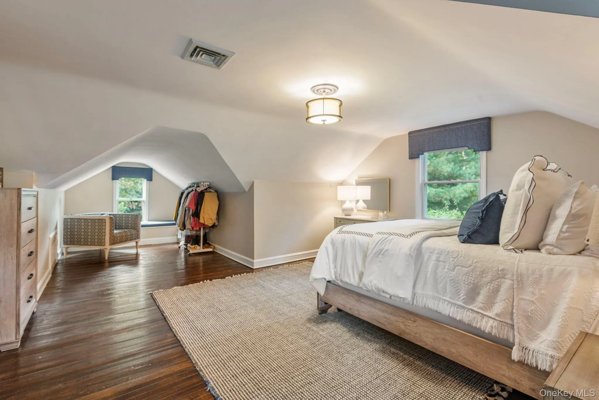 Primary bedroom with extra room for seating area or storage. Plus a window seat! Primary bedroom with extra room for seating area or storage. Plus a window seat!