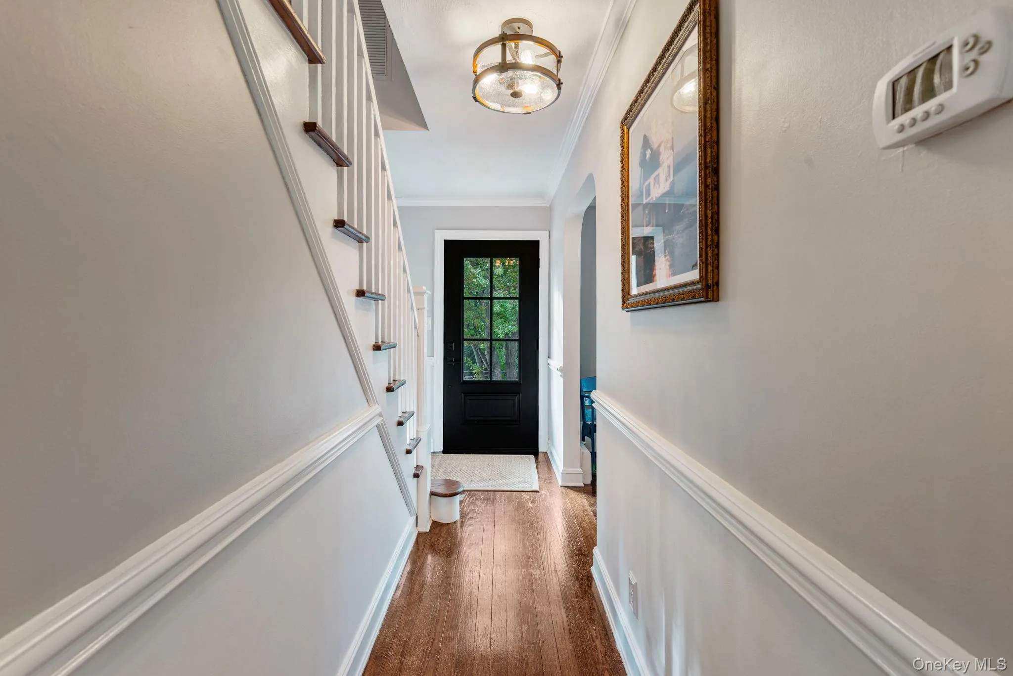 Hall from entrance to kitchen. Hall from entrance to kitchen.