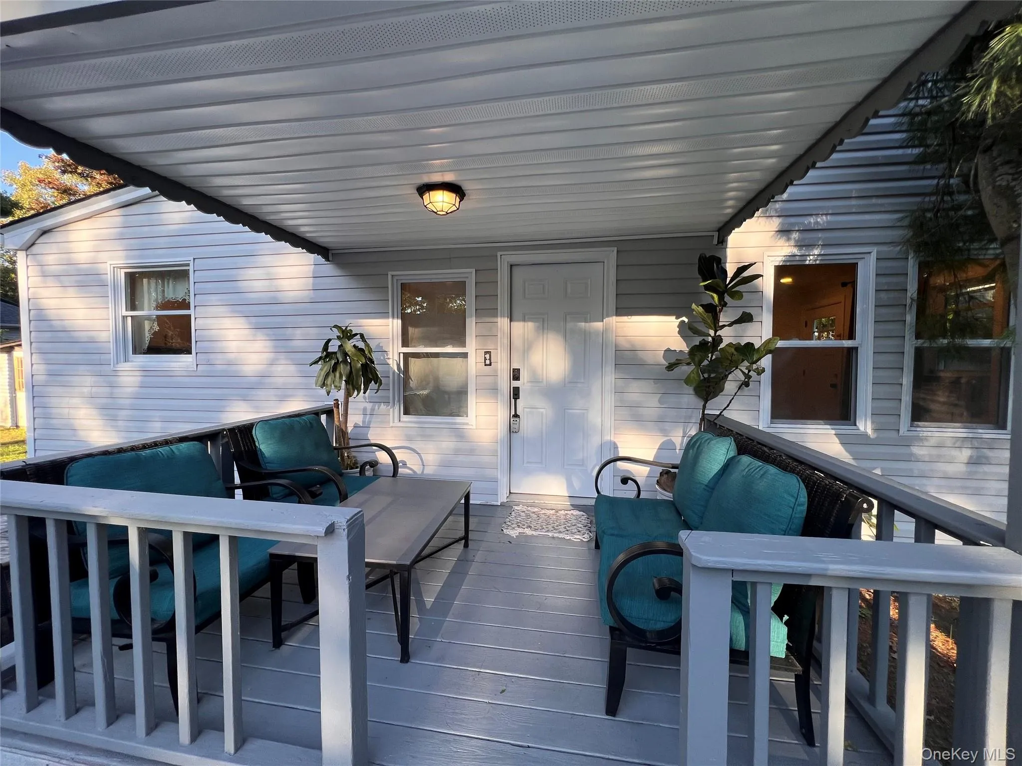 Covered porch with seating area Covered porch with seating area