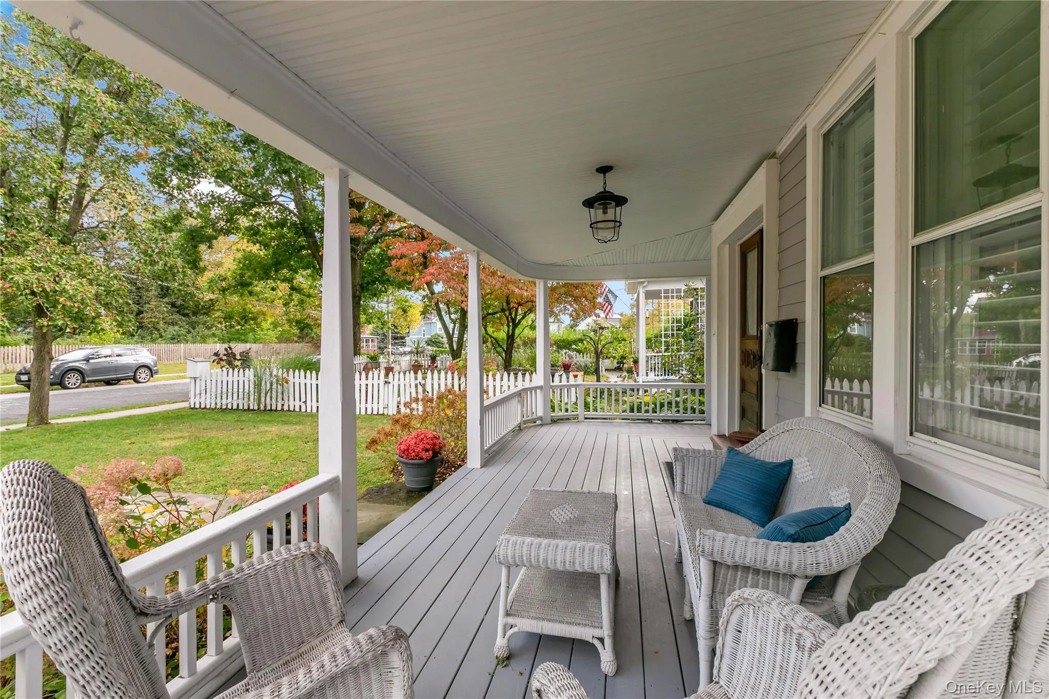 Welcoming gracious covered front porch. Welcoming gracious covered front porch.