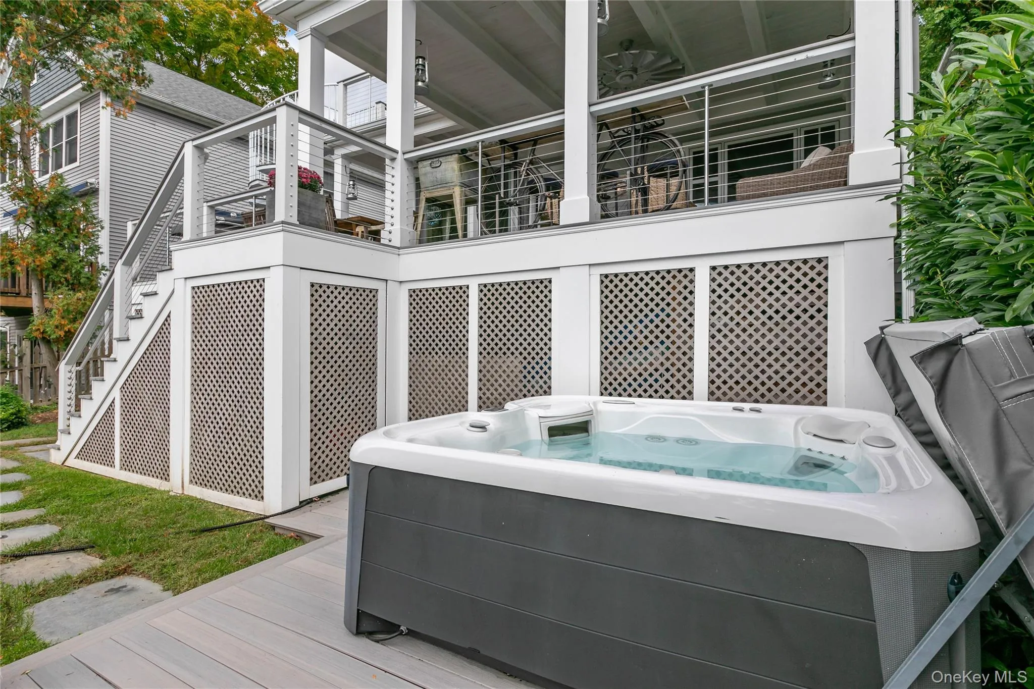 Custom decking with hot tub included. Custom decking with hot tub included.