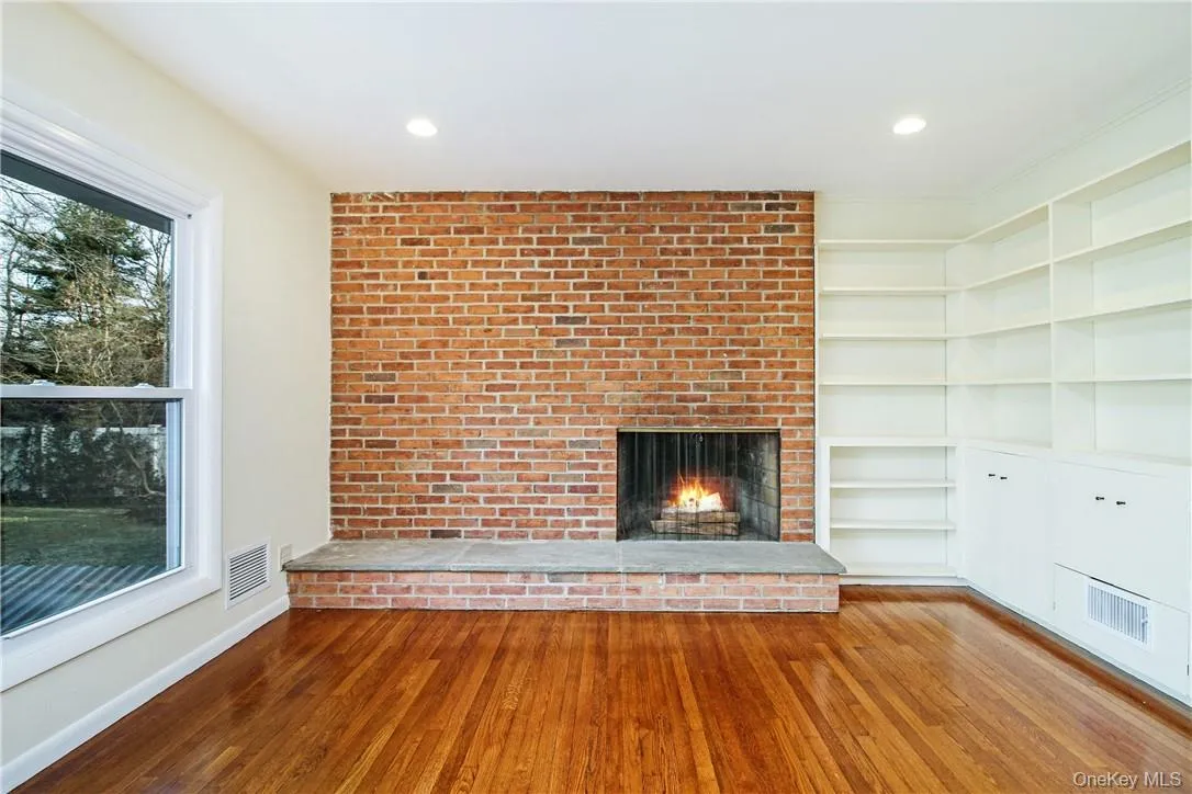 Close up of fireplace and built-ins. Photos taken when house was empty prior to occupancy. Close up of fireplace and built-ins. Photos taken when house was empty prior to occupancy.