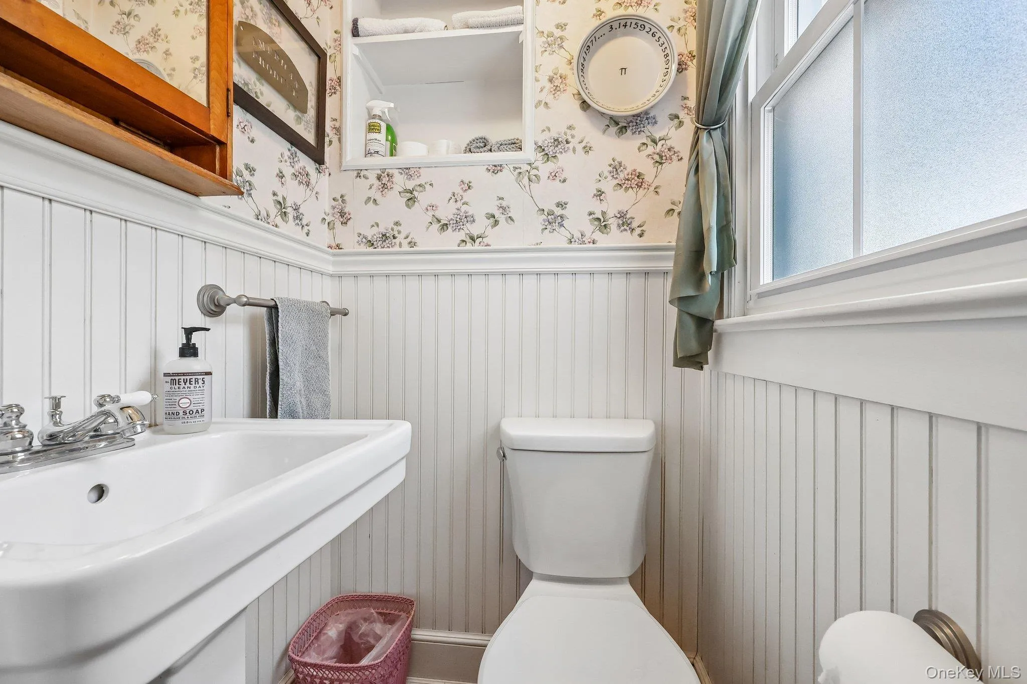 main floor half bathroom-off the laundry room main floor half bathroom-off the laundry room