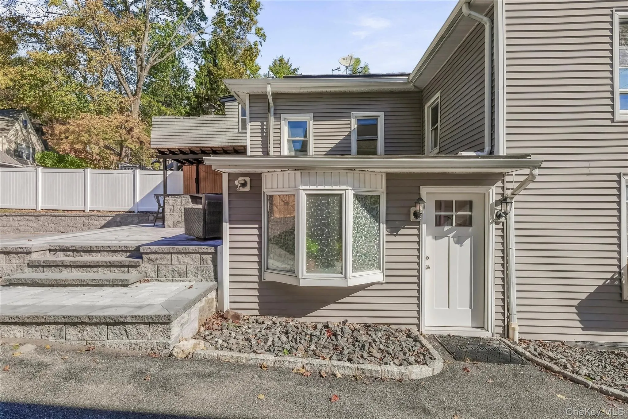 Conveniently located rear kitchen exit providing seamless, easy access to both the private backyard and the detached 2-car garage. Conveniently located rear kitchen exit providing seamless, easy access to both the private backyard and the detached 2-car garage.