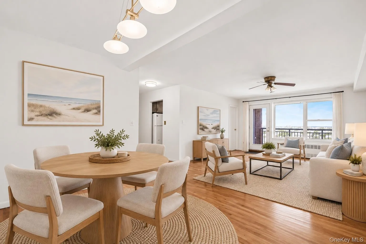 Virtually staged dining area and living room Virtually staged dining area and living room