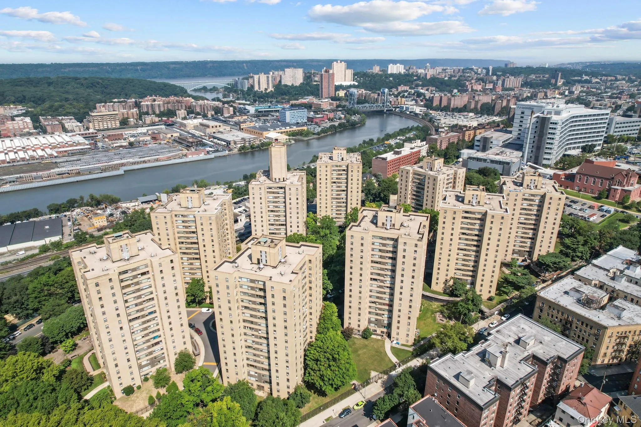 Expansive urban landscape with multiple high-rise residential buildings Expansive urban landscape with multiple high-rise residential buildings