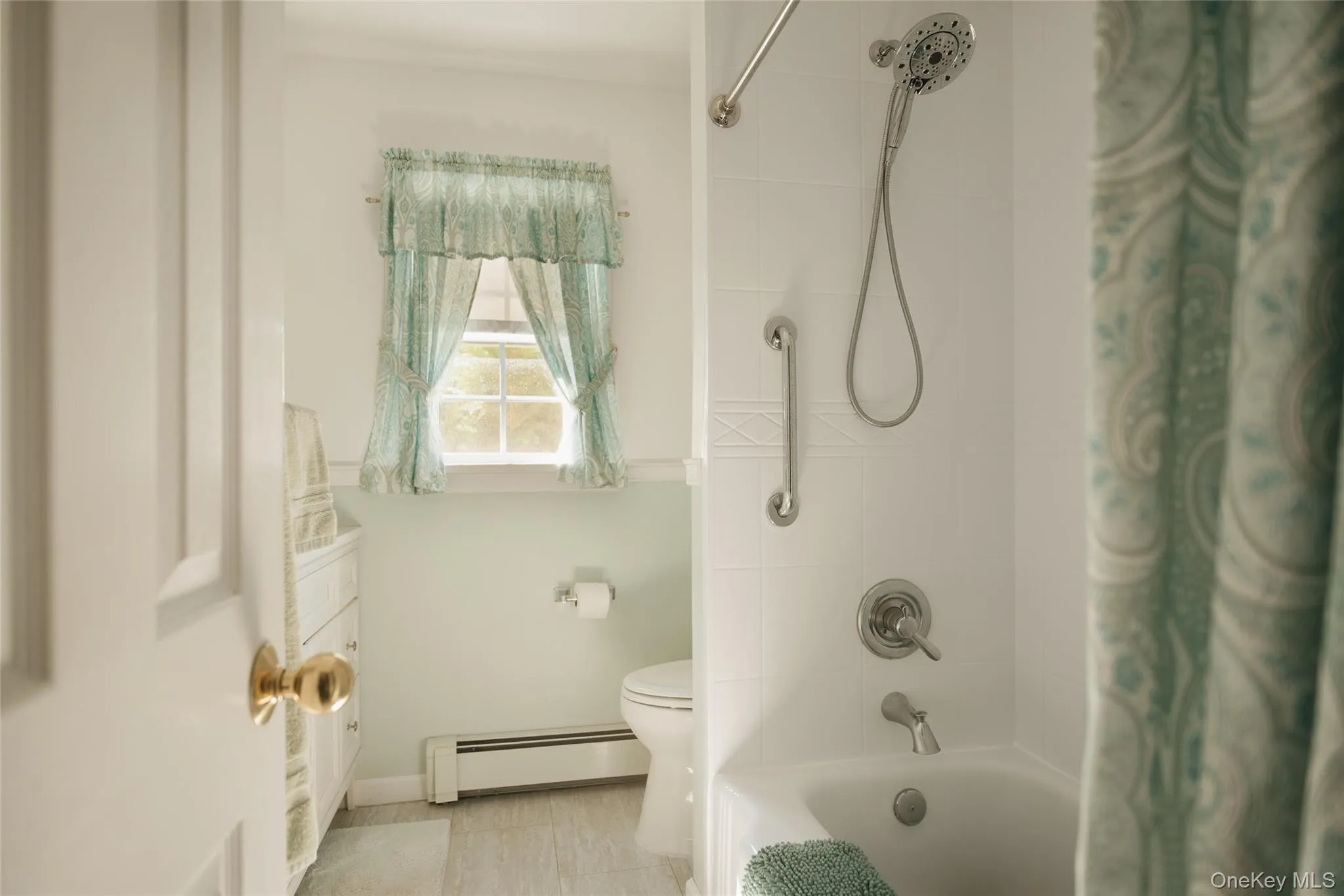 Full bath upstairs with recent upgrades including bath fitter Full bath upstairs with recent upgrades including bath fitter