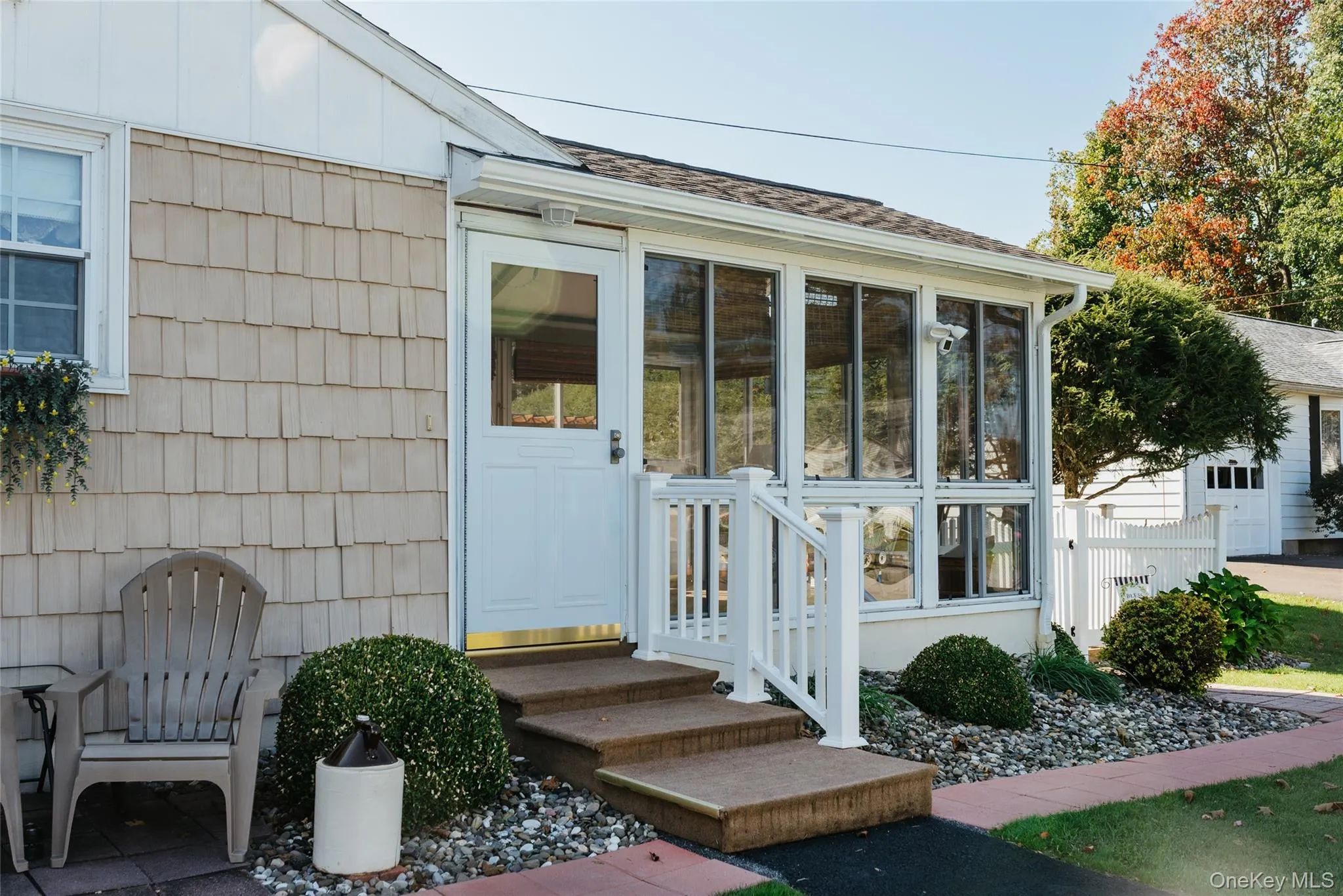 Highly functional enclosed porch off the kitchen Highly functional enclosed porch off the kitchen