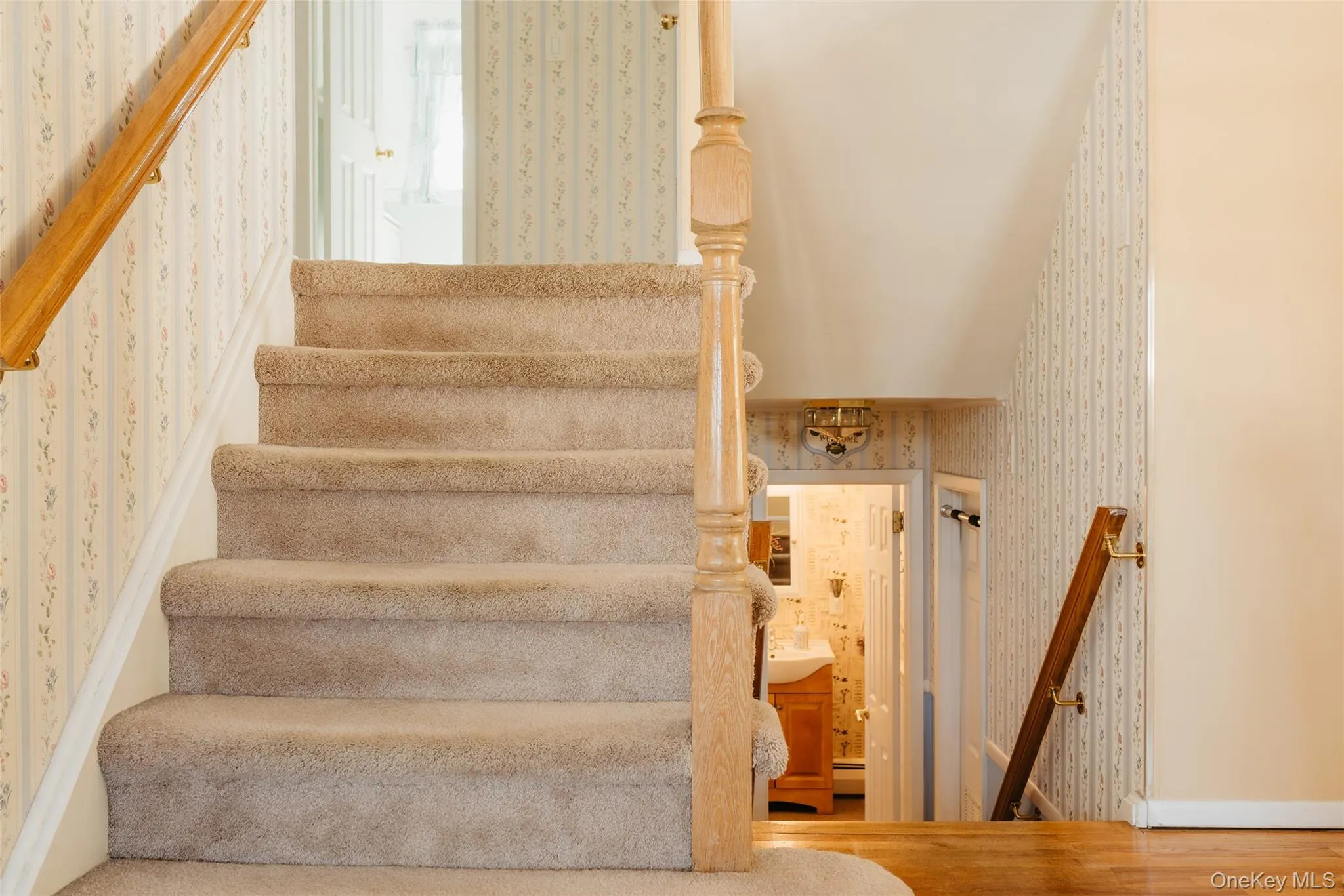 Steps up to the bedrooms or down to the finished lower level Steps up to the bedrooms or down to the finished lower level