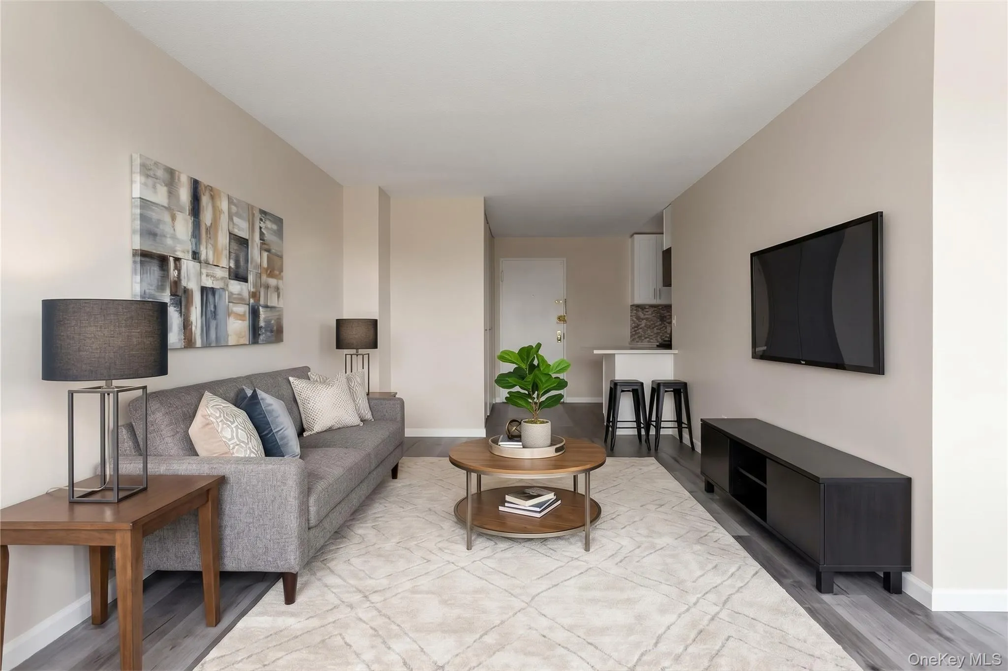 Large living room with an L shaped sleeping alcove Large living room with an L shaped sleeping alcove