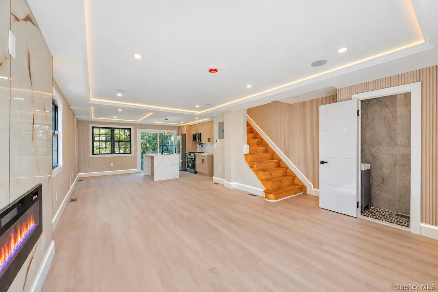 Recessed lighting and cove lighting illuminate high ceilings Recessed lighting and cove lighting illuminate high ceilings