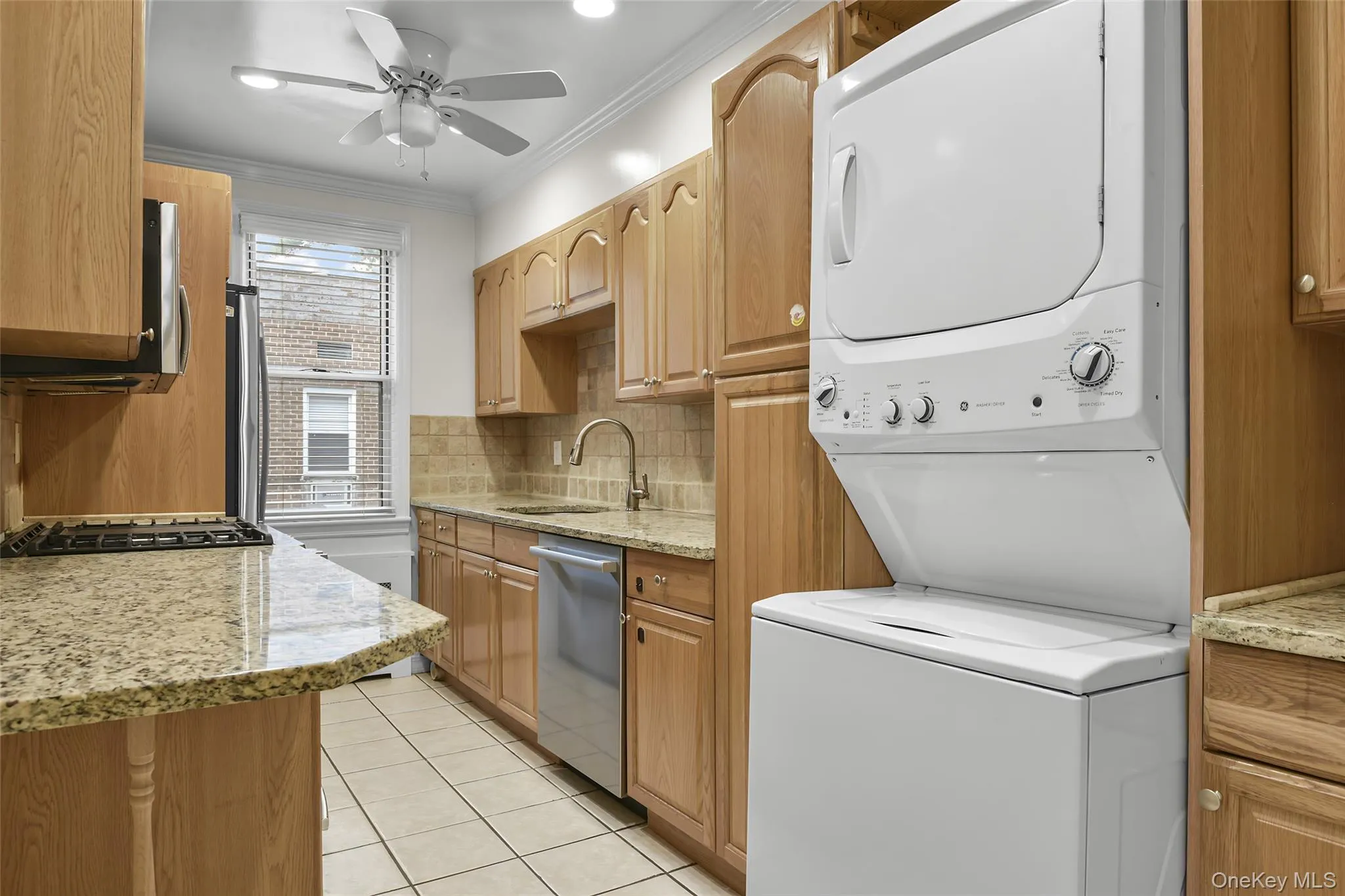 Updated kitchen with new stainless steel appliances and laundry area. Updated kitchen with new stainless steel appliances and laundry area.