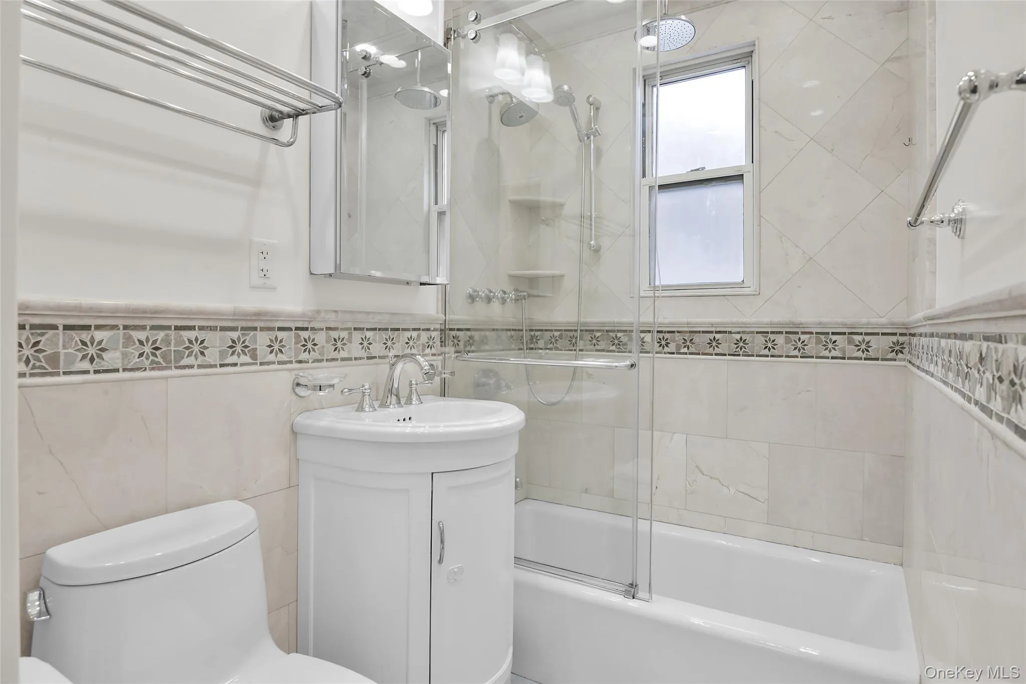 Hallway linen closet and full hallway bathroom with a bathtub. Hallway linen closet and full hallway bathroom with a bathtub.