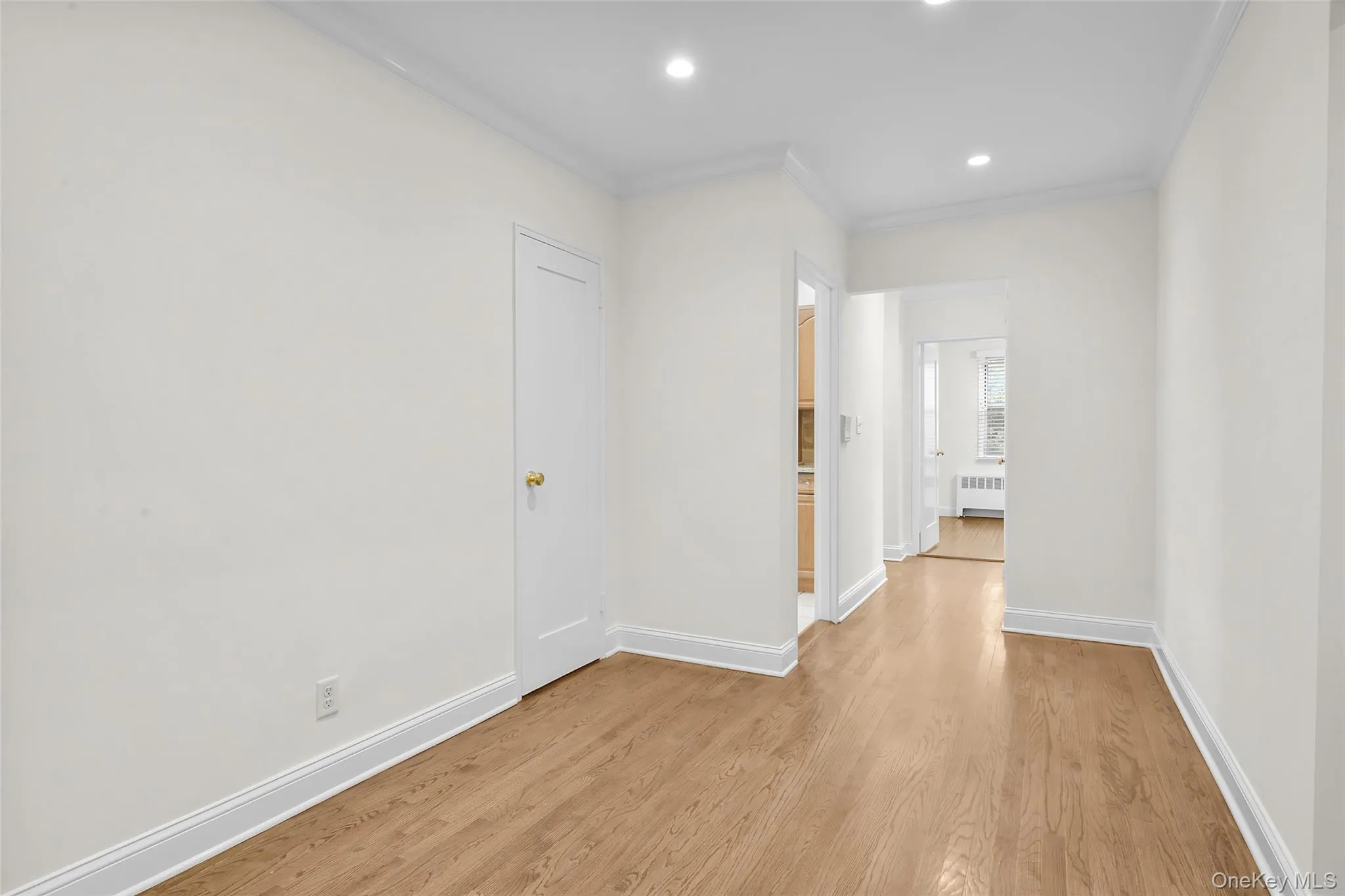 Spacious foyer with a dining area and closet. Spacious foyer with a dining area and closet.