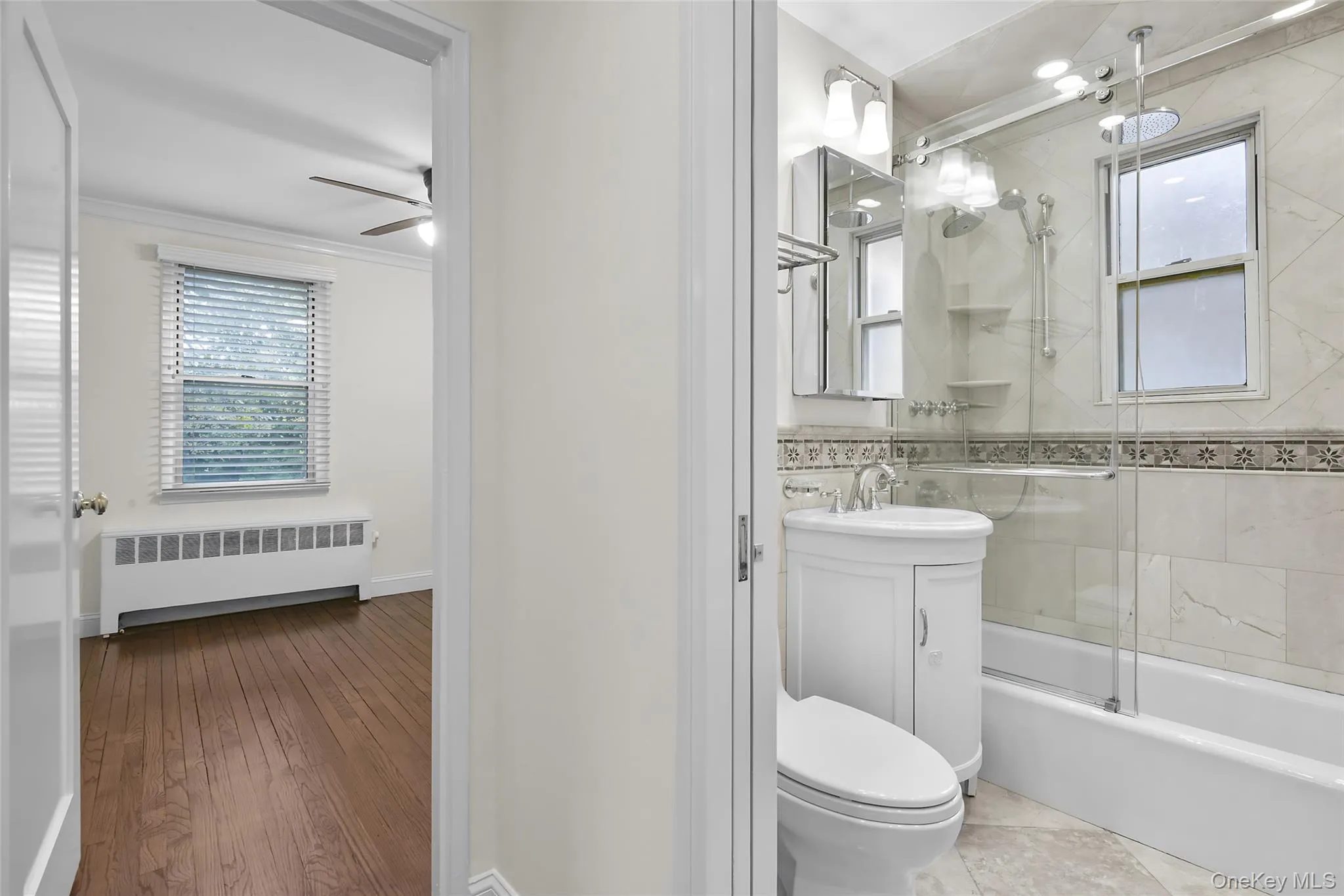 Full hallway bathroom with a bathtub. Full hallway bathroom with a bathtub.