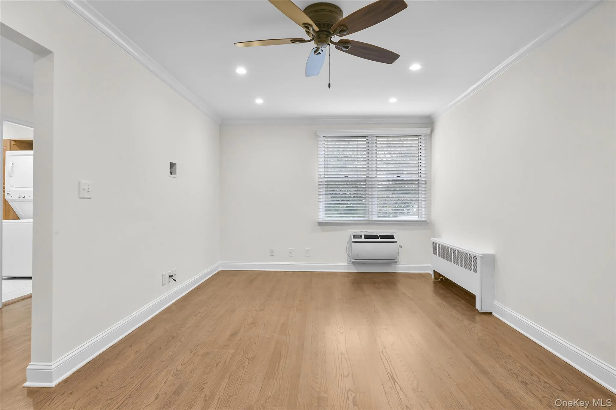 Oversized living room with recessed lights and fan. Oversized living room with recessed lights and fan.