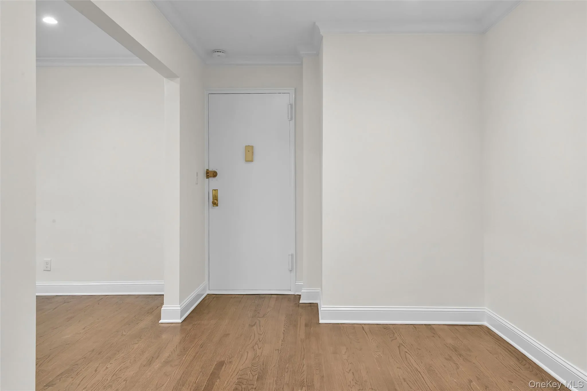 Spacious foyer with a dining area and closet. Spacious foyer with a dining area and closet.