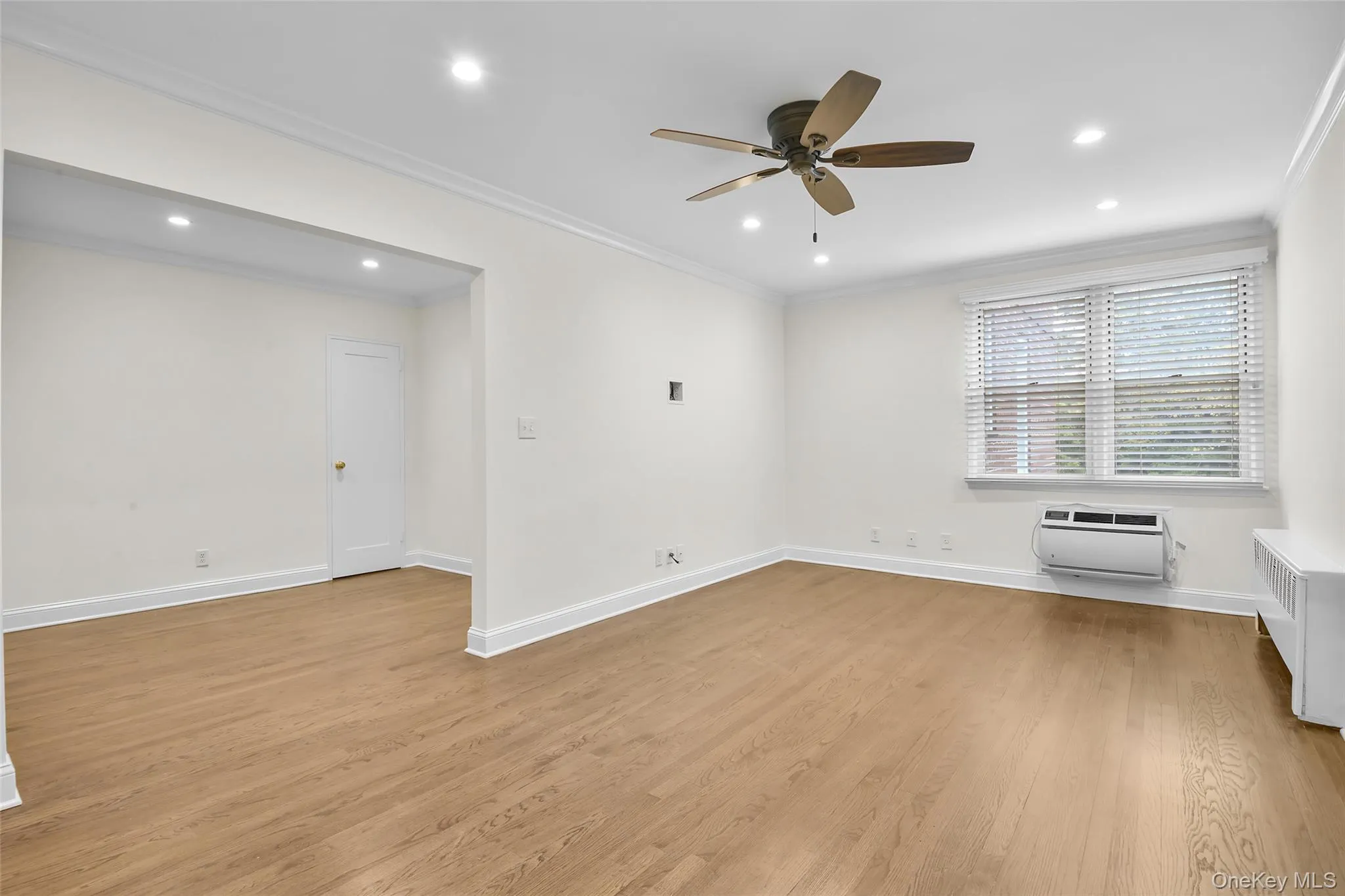 Oversized living room with recessed lights and fan. Oversized living room with recessed lights and fan.