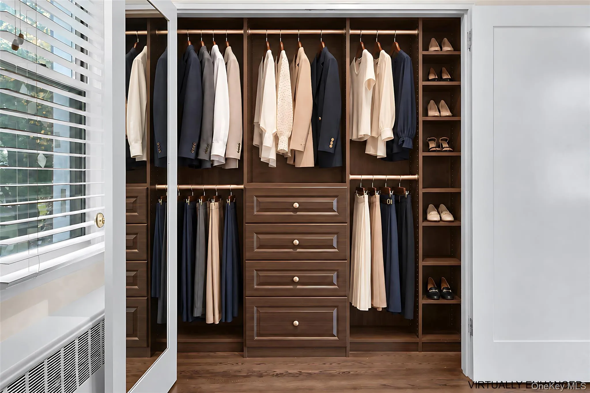 Virtually Staged: Primary bedroom with a large custom closet. Virtually Staged: Primary bedroom with a large custom closet.