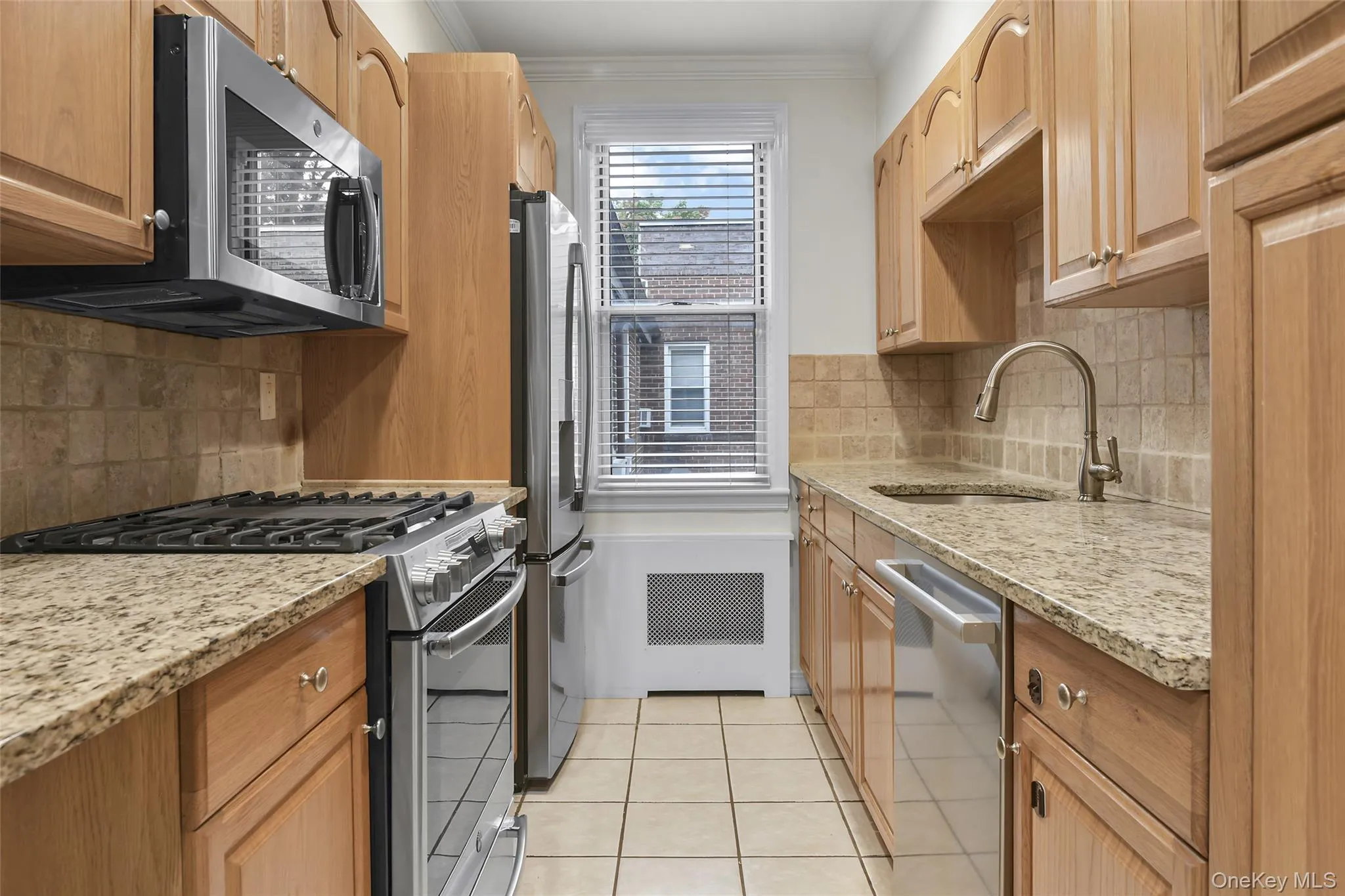 Updated kitchen with new stainless steel appliances and laundry area. Updated kitchen with new stainless steel appliances and laundry area.