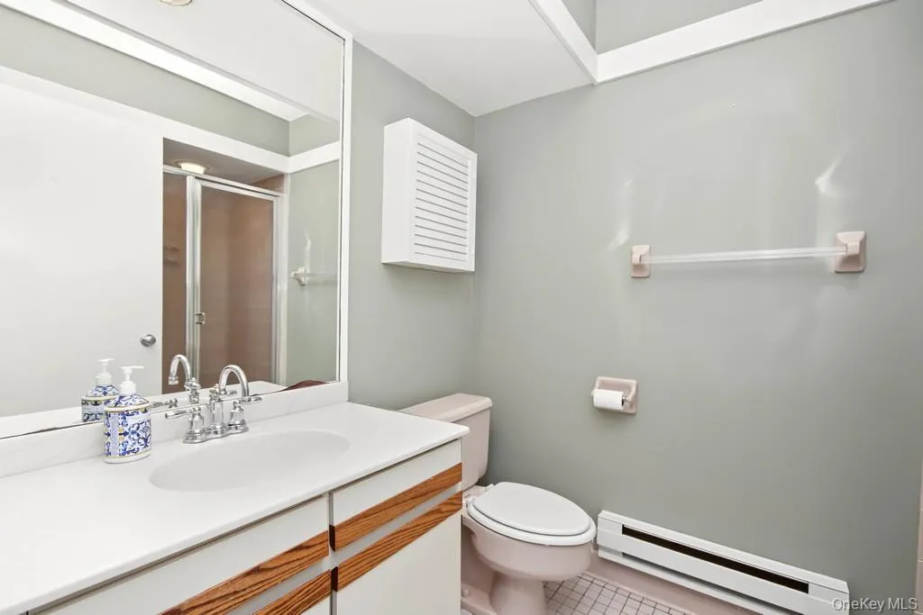 Second Bathroom has sink with vanity and stall shower Second Bathroom has sink with vanity and stall shower