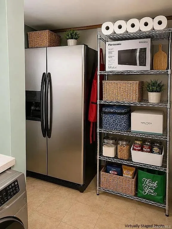 Stainless steel side-by-side refrigerator with exterior ice and water dispenser Stainless steel side-by-side refrigerator with exterior ice and water dispenser