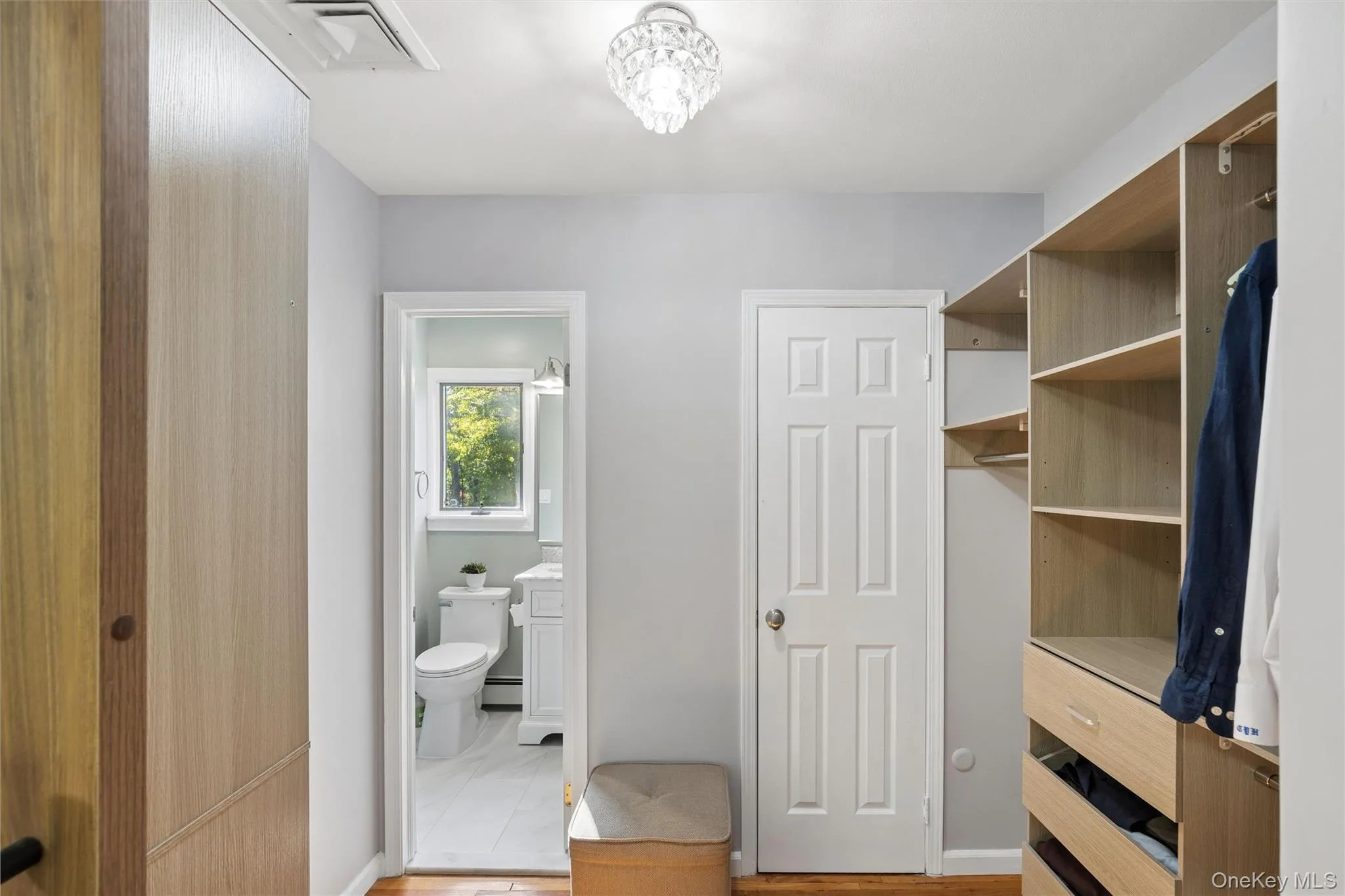 primary suite with 2 walk in closets primary suite with 2 walk in closets