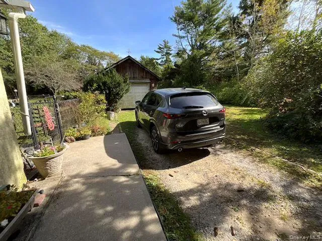 Driveway with detached garage Driveway with detached garage