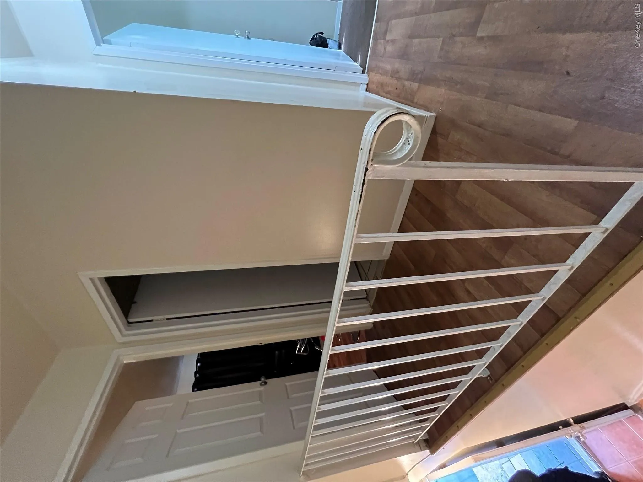 Stairs with wood finished floors and baseboards Stairs with wood finished floors and baseboards