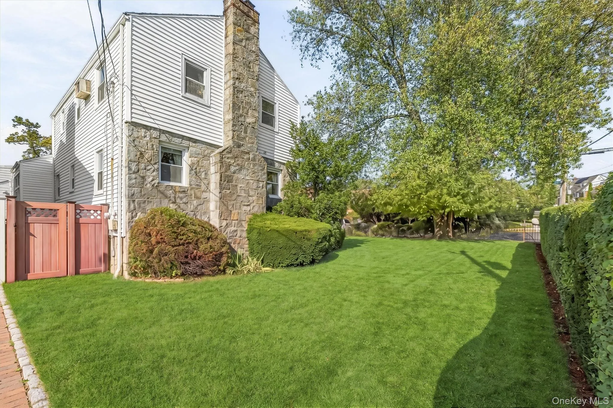 Lush, level grounds and gated surroundings create a private setting with enduring appeal. Lush, level grounds and gated surroundings create a private setting with enduring appeal.