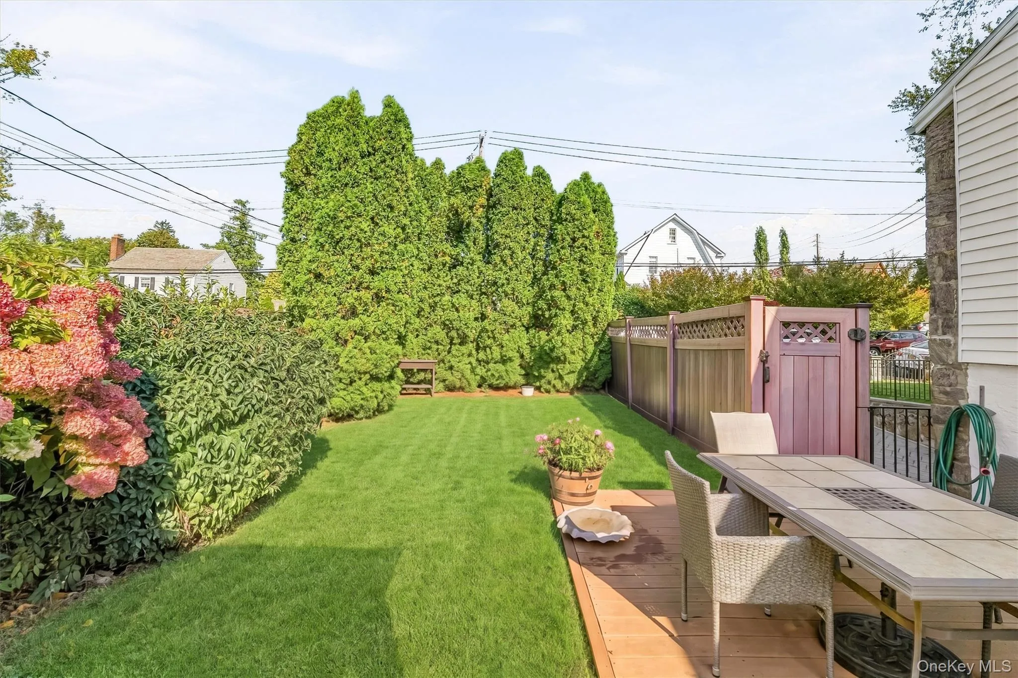 A private outdoor setting offers a welcoming escape for relaxation and gatherings. A private outdoor setting offers a welcoming escape for relaxation and gatherings.