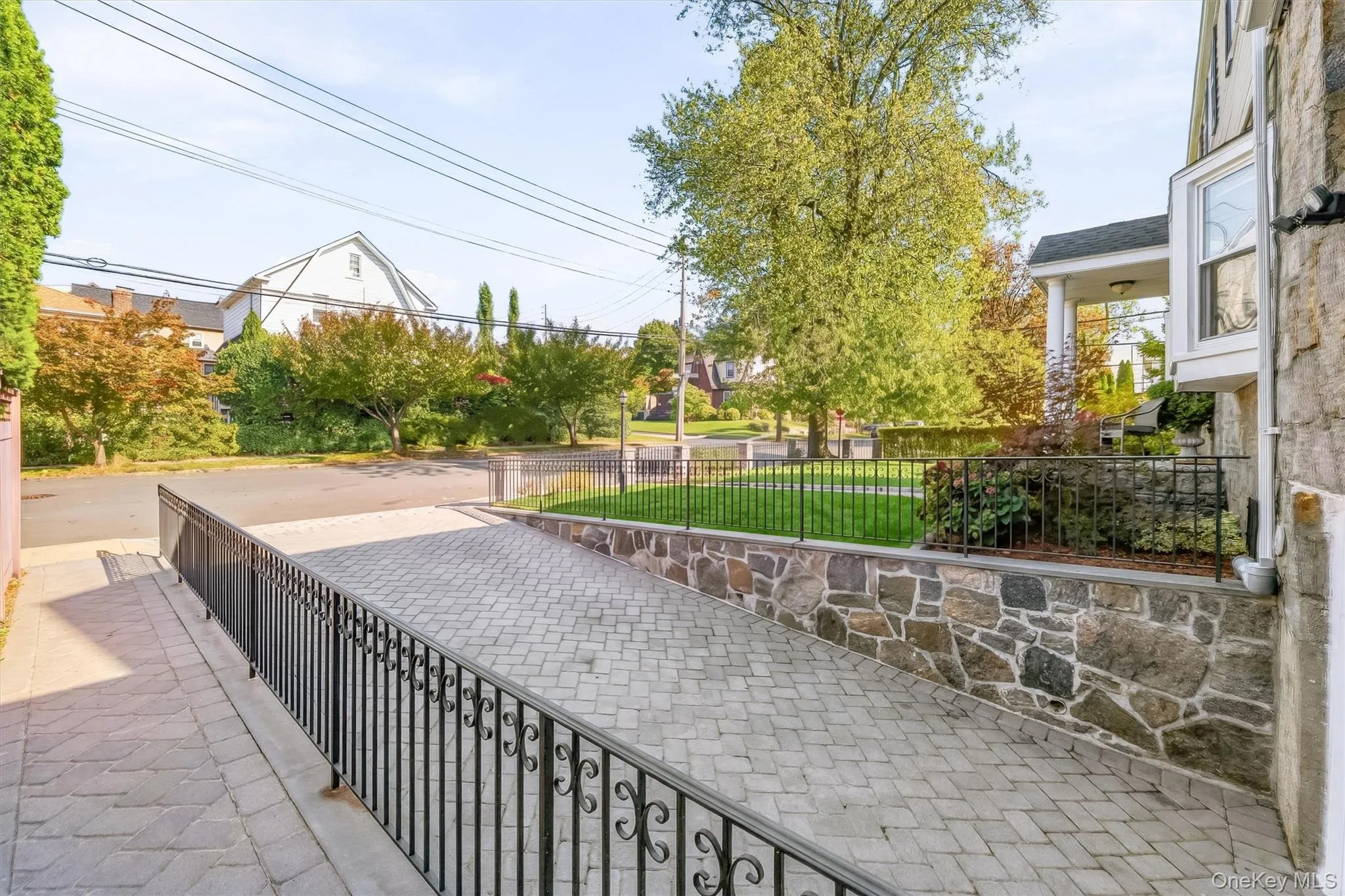 Stone-front character, classic Colonial lines, and an elegant gated entrance create a memorable first impression. Stone-front character, classic Colonial lines, and an elegant gated entrance create a memorable first impression.